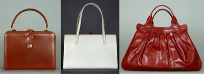 Lot 292 - Three Daytime Bags 1980s The first of burgundy...