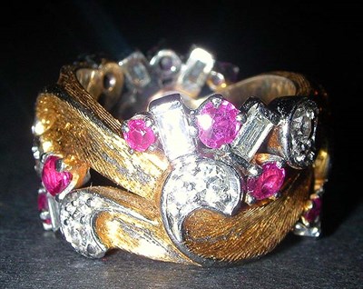 Lot 312 - Retro Ruby and Diamond Ring The 14 kt. yellow...