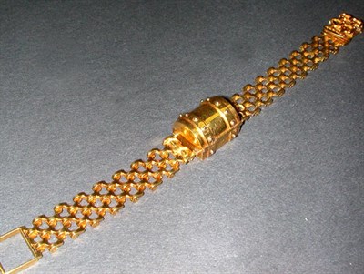 Lot 330 - Lady's Gold Novelty Wriswatch The 18 kt....