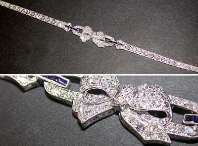 Lot 433 - Diamond Line Bracelet White gold, designed as...