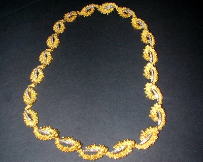 Lot 376 - Gold and Diamond Necklace 18 kt. yellow gold,...