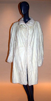 Lot 243 - Ermine Coat 1930s Three-quarter length, with...