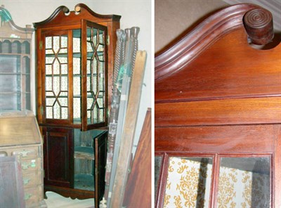 Lot 243 - Walnut Corner Cabinet The scrolled pediment...