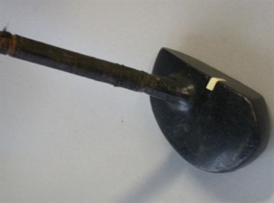 Lot 21 - A Kempshall ebonite centre shaft putter.