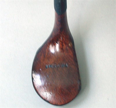 Lot 27 - A T. Morris persimmon headed driver, the shaft...