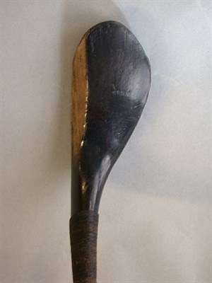 Lot 32 - A J. Anderson spoon in dark stained beech.