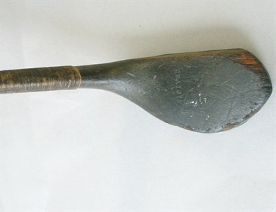 Lot 35 - A Craigie late transitional putter in dark...