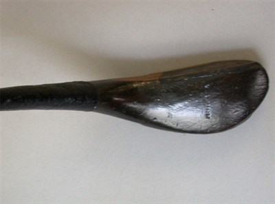 Lot 36 - A T. Dunn transitional brassie with half...