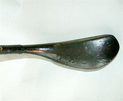 Lot 44 - An A. Patrick mid spoon in dark stained beech...