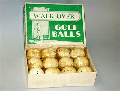 Lot 57 - A boxed dozen Walk-Over square dimple balls. (13)
