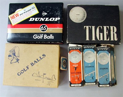 Lot 118 - A Tiger 12 box; a boxed dozen Dunlop 65's; a...
