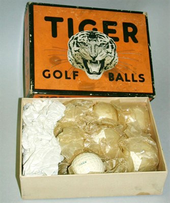 Lot 137 - A US Tiger golf ball 12 box with seven wrapped...