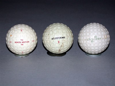 Lot 160 - A Silver King square dimple; a North British;...