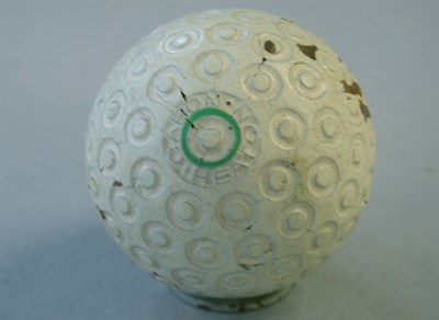 Lot 198 - A Capon Heaton small ring with green ring...