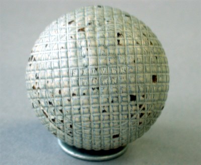 Lot 239 - An early Silvertown mesh gutty with small...