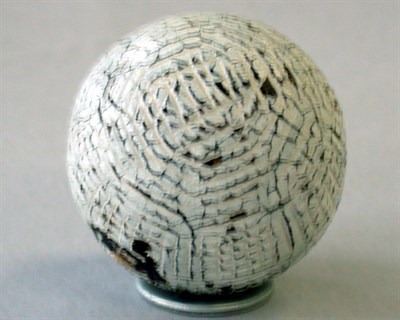 Lot 240 - A hand hammered gutta with Forgan style mesh...