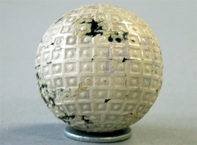 Lot 259 - An unnamed cameo dot in square dimple ball,...