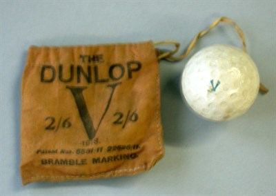 Lot 260 - A Dunlop V brown printed linen drawstring bag...