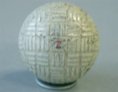 Lot 270 - A waffle pattern ball with triple weave design,...