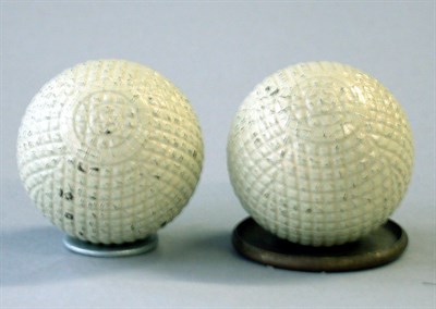 Lot 271 - A pair of mint BGI remade mesh gutty balls...