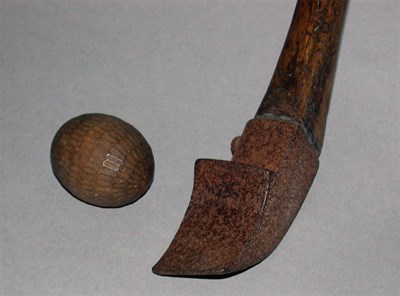 Lot 280 - An antique Chole club with two faced iron head,...