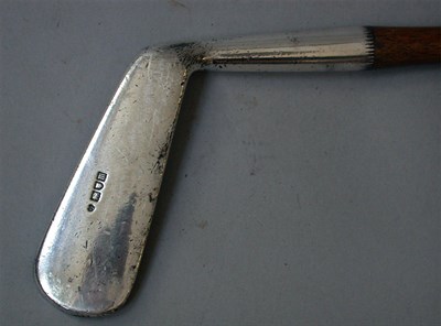 Lot 281 - A presentation silver headed blade putter with...