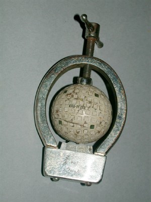 Lot 285 - A Simplex chromed metal golf ball marker.