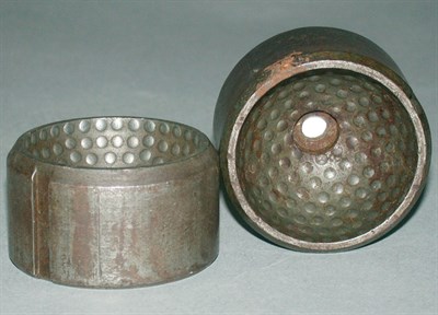 Lot 291 - An iron dimple ball mould, 2".