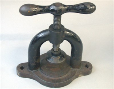 Lot 293 - A cast iron gutty ball screw press with shaped...