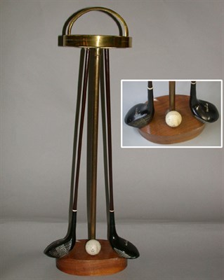 Lot 297 - A standing brass ashtray on stem with oval...