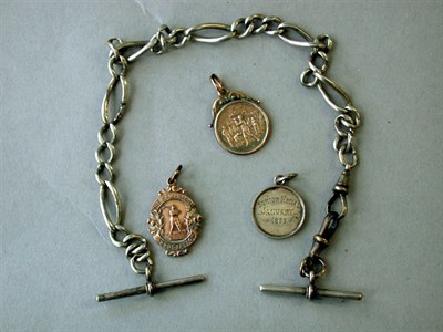 Lot 310 - An Edwardian silver watch chain with gold golf...