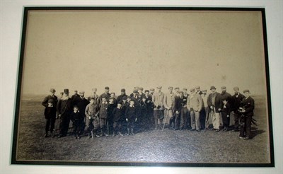 Lot 317 - A sepia photograph of a golfing group at St....