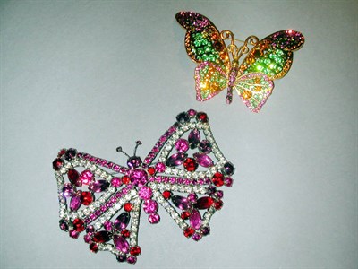 Lot 429 - Two Butterfly Pins One large openwork setting...