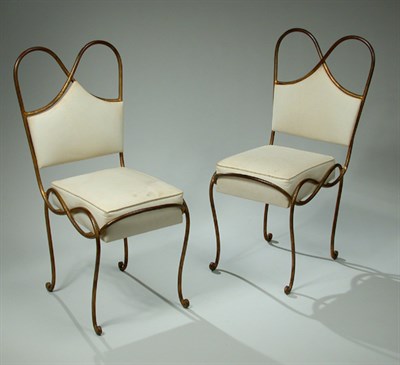 Lot 69 - Set of Six Gilt Wrought Iron Chairs Designed...