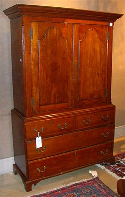 Lot 184 - Chippendale Cherry Linen Press The molded...