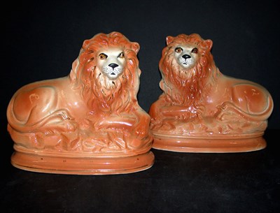 Lot 296 - Pair of Staffordshire Pottery Lions Each with...