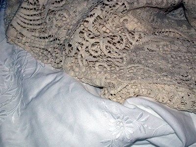 Lot 504 - Two Round White Tablecloths The first of fine...
