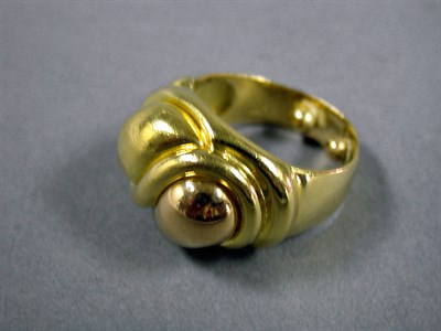 Lot 56 - Gold Dome Ring 14 kt. two-tone gold, the domed...