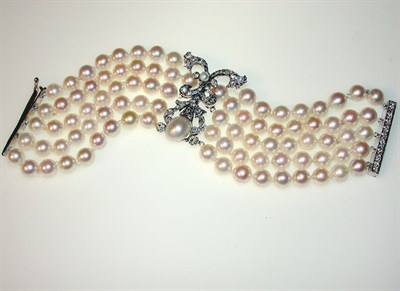Lot 383 - Cultured Pearl and Diamond Bracelet Composed...
