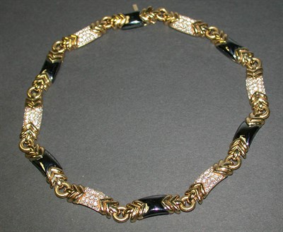 Lot 437 - Diamond and Hematite Necklace 18 kt. yellow...