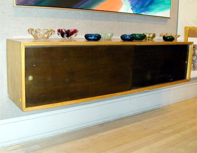 Lot 110 - Blond Wood Hanging Cabinet Designed by George...