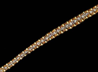 Lot 379 - Gold and Diamond Bracelet 18 kt. yellow gold,...