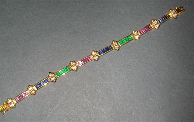 Lot 325 - Diamond and Multicolored Stone Bracelet 18 kt....