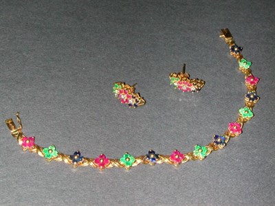Lot 280 - Gold and Multicolored Stone Bracelet and Pair...