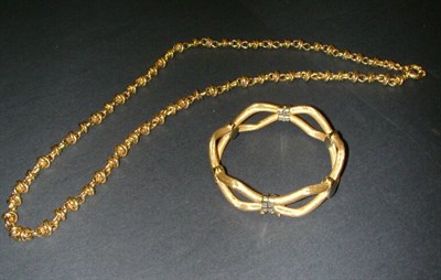 Lot 109 - Gold Bracelet and Chain 14 kt. yellow gold,...