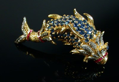Lot 132 - Diamond, Sapphire and Ruby Fish Pin 18 kt....