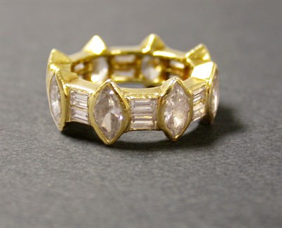 Lot 459 - Diamond Wedding Band The 18 kt. yellow gold...