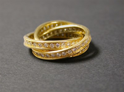 Lot 408 - Diamond Rolling Ring 18 kt. yellow gold,...
