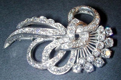 Lot 301 - Diamond Spray Pin 18 kt. white gold, designed...