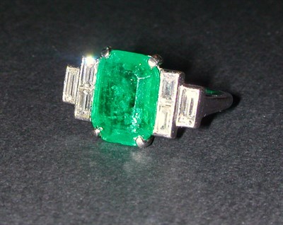 Lot 359 - Emerald and Diamond Ring Platinum, set to the...